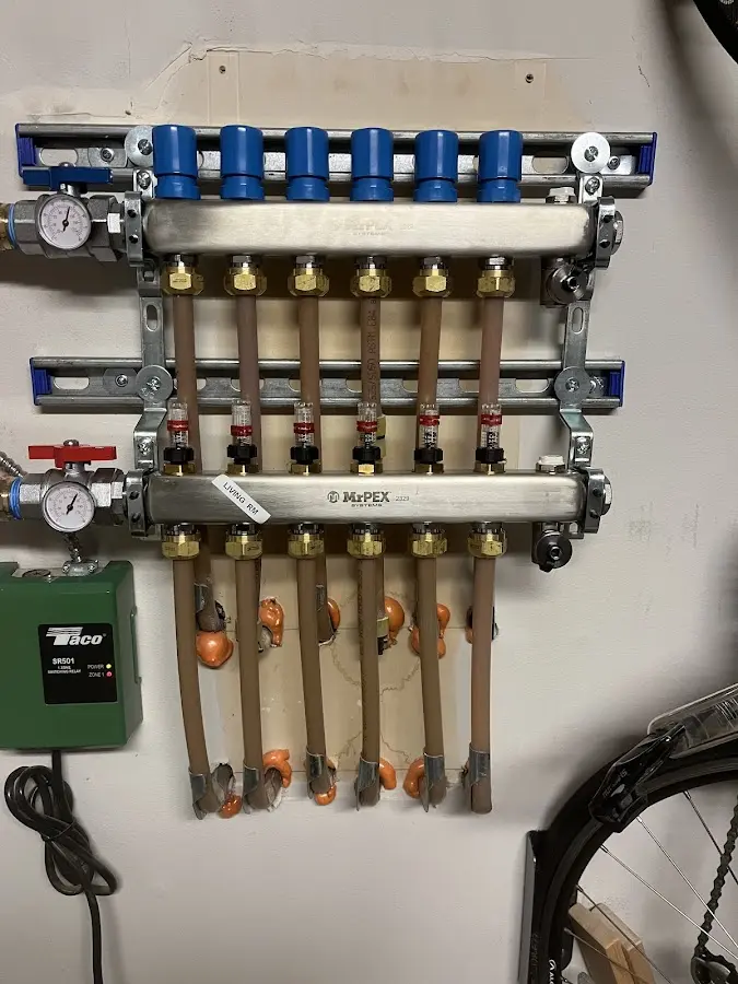 Plumber performing Water Heater Repair at a residential property in Morris Plains